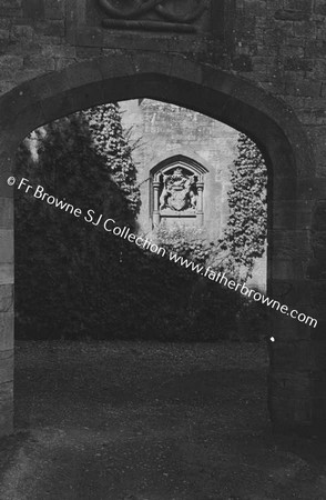 LISMORE CASTLE  CREST THROUGH ARCHWAY NEAR GARDEN